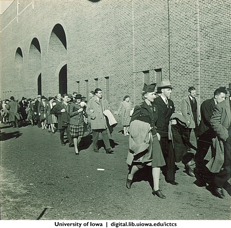 Football game attendees outside Iowa Stadium, The University of Iowa, 1940s