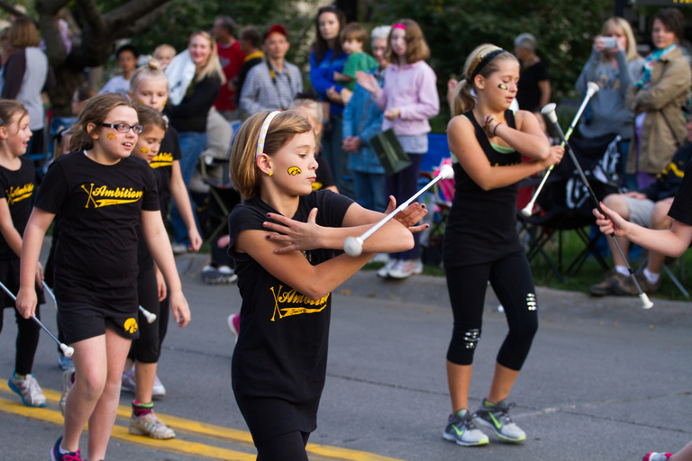 Children dancing in the homecoming parade