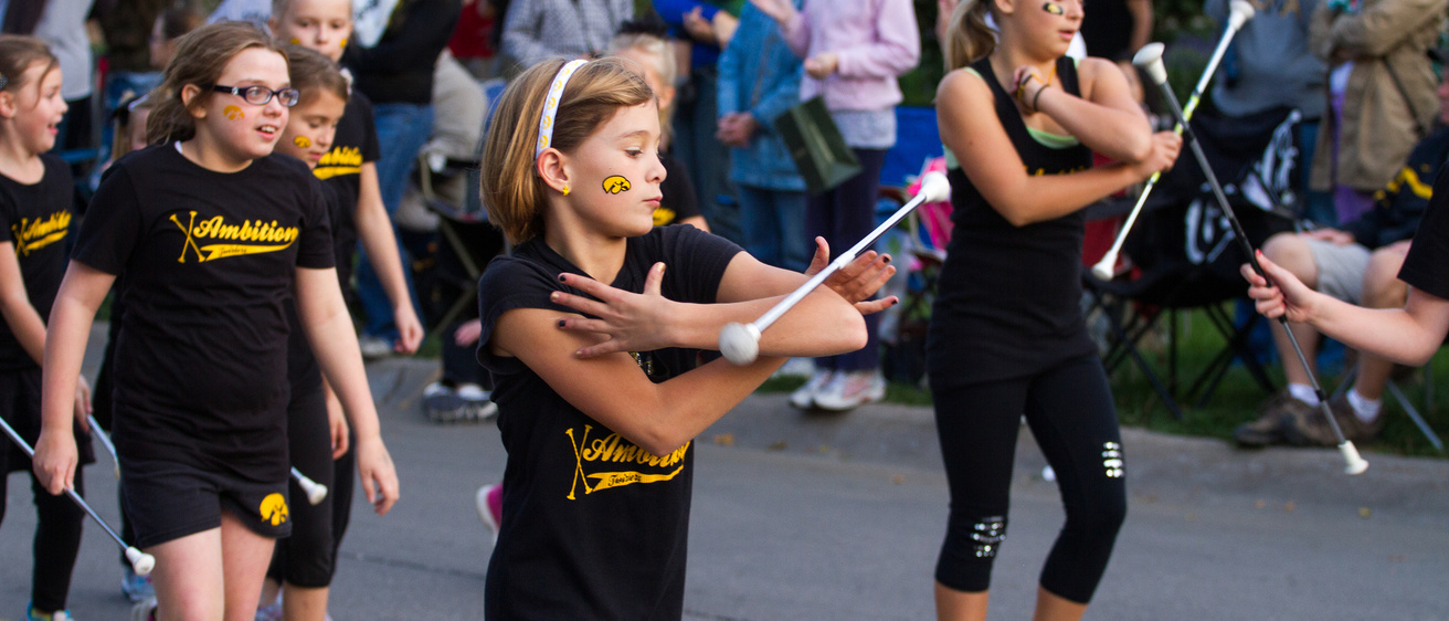 Children dancing in the homecoming parade