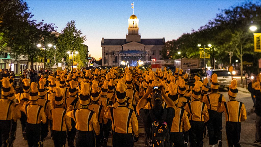 marching band in front of the old capitol in iowa city